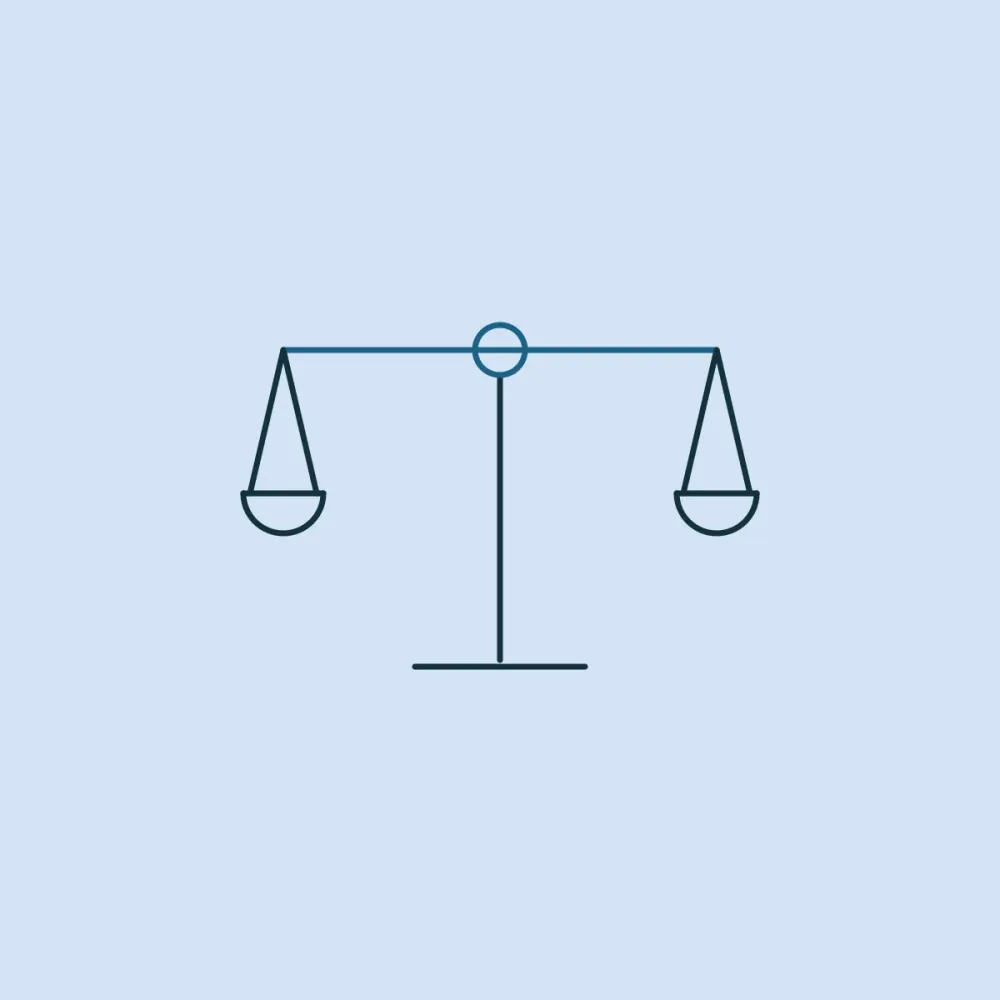 A pair of balance scales holding level